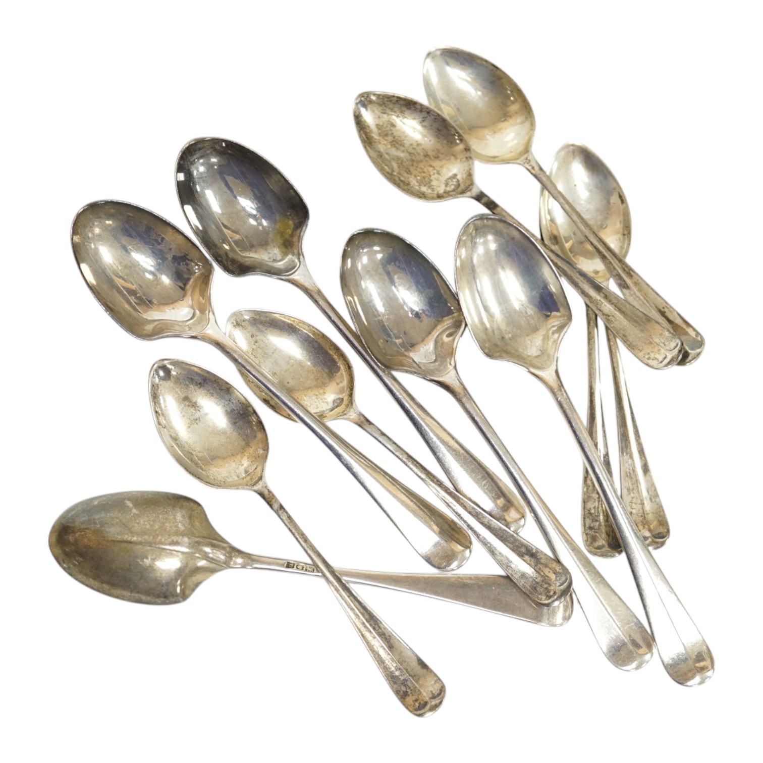 A set of six George V silver coffee spoons, London, 1912 and a set of five similar silver egg spoons, London, 1915, 5.1oz. Condition - fair